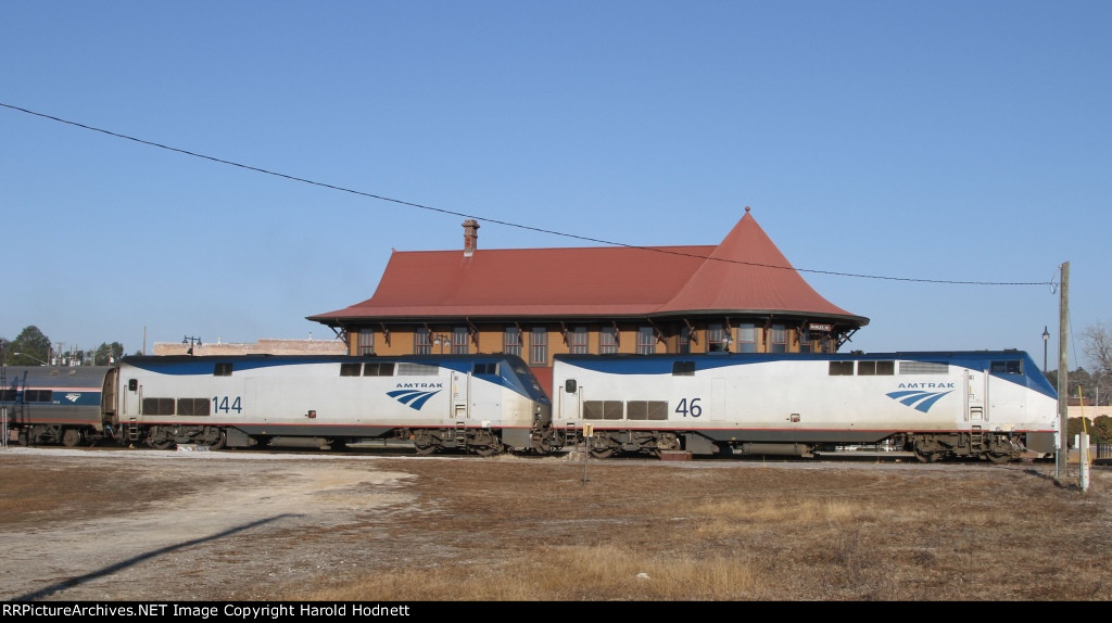 AMTK 46 & 144 lead a late train P092 to a stop at the station